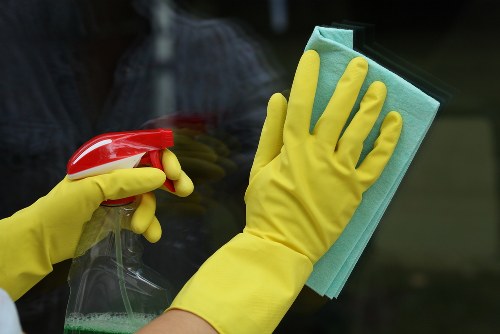 Carpet cleaning team preparing equipment safely before work